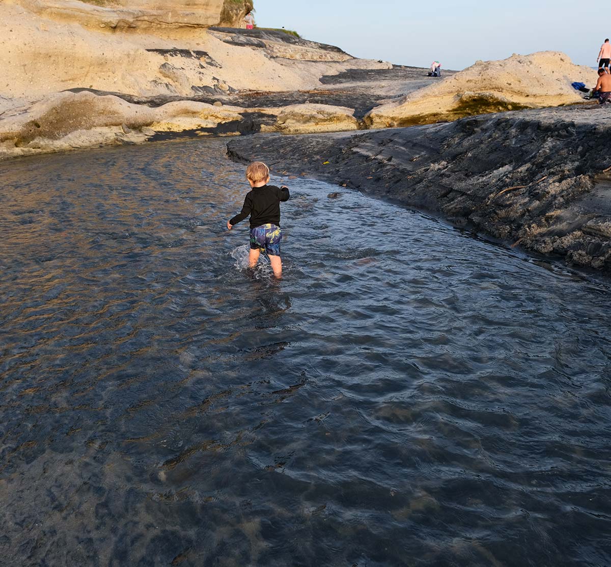 home baby on beach water
